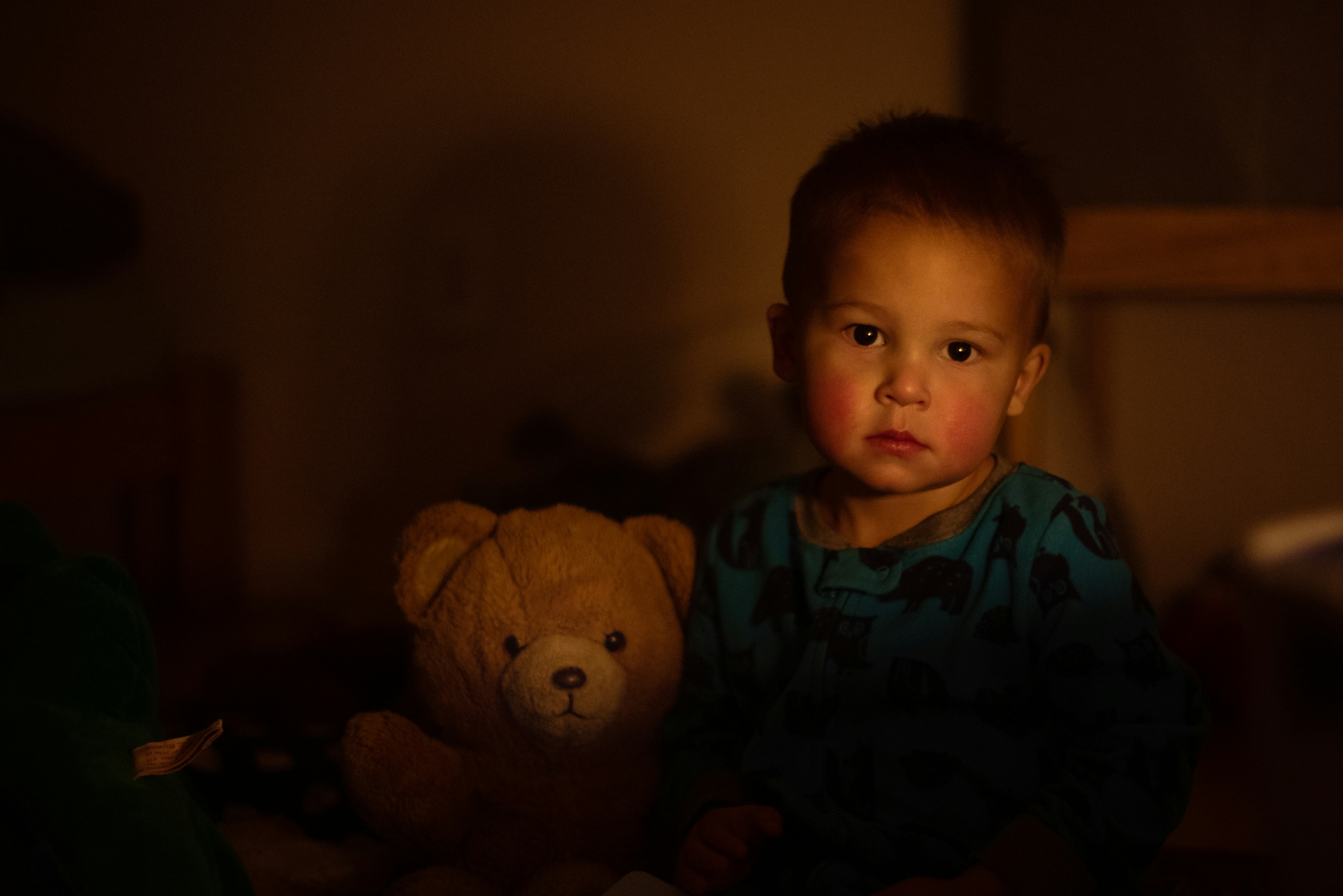 child with teddy bear