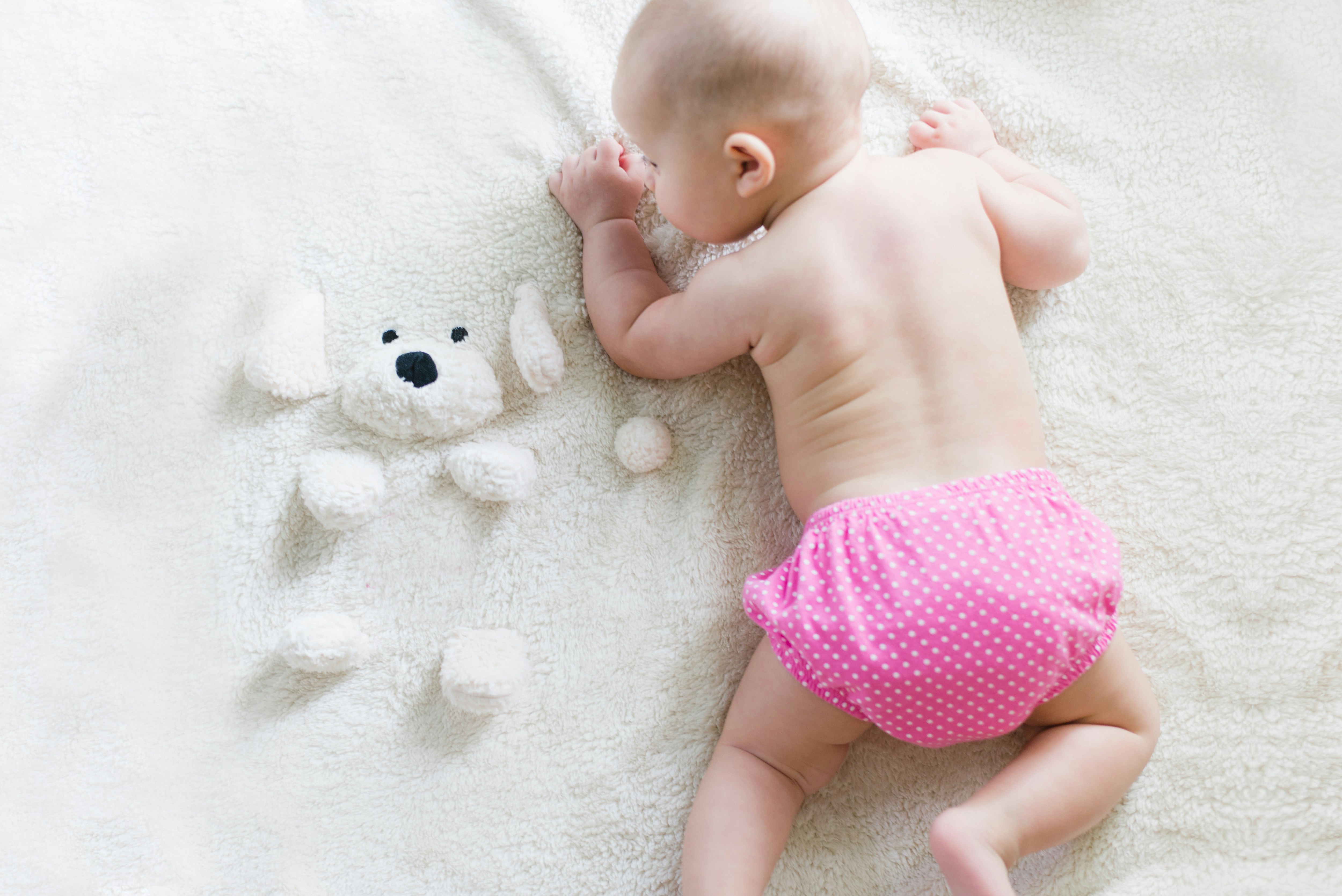 child with teddy bear