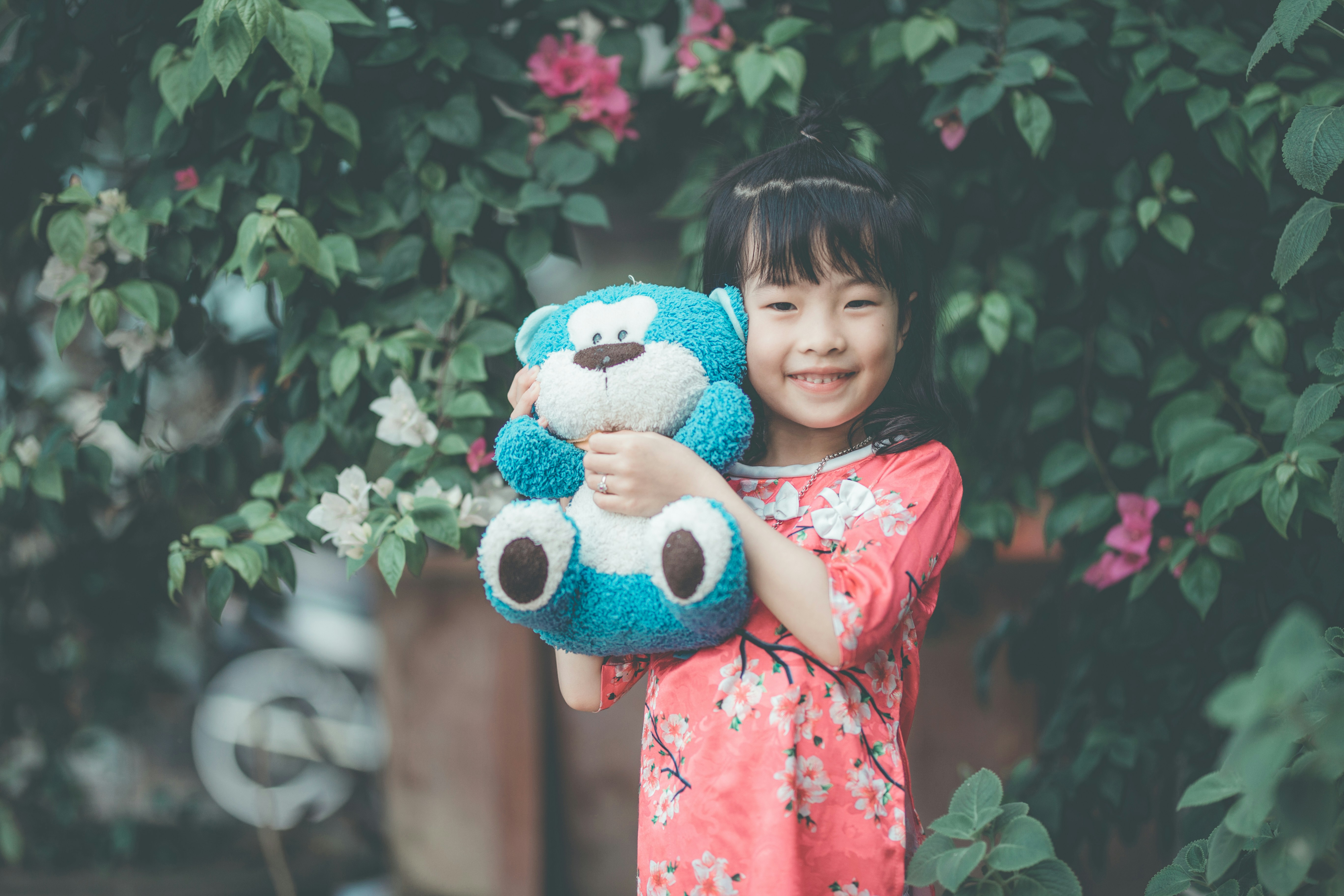 child with teddy bear