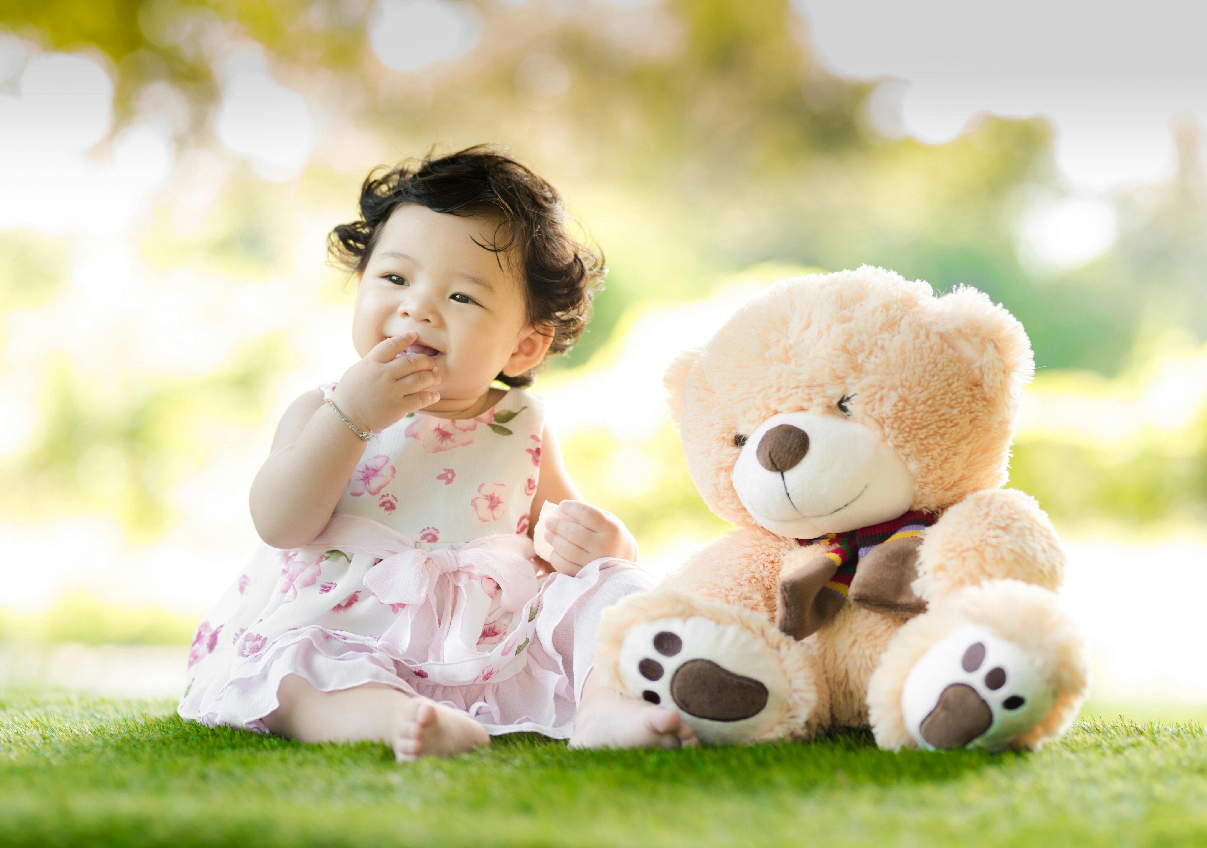 child with teddy bear